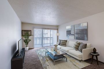 Moorhead apartment for rent - a living room with a couch and a coffee table