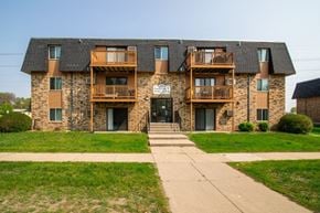 Bismarck apartment for rent - an apartment building on a sunny day with a sidewalk in front of it