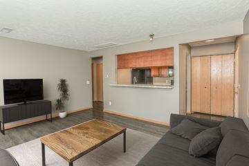 Omaha apartment for rent - a living room with a couch and a coffee table