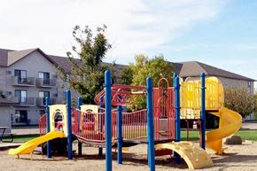 Hutchinson apartment for rent - Hutchinson, MN Deer Park Apartments | Exterior with a park