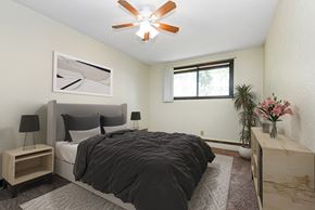 White Bear Lake apartment for rent - White Bear Lake, MN White Bear Terrace Apartments. a bedroom with a large bed and a ceiling fan