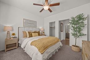 Ontario apartment for rent - Master bedroom with walk-in closet and ensuite bathroom at Paloma Apartment Homes, California, 91761