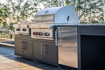 Grilling stations with outdoor kitchens