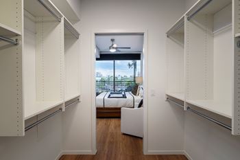 Expansive walk-in and millwork closets with built-in shelving