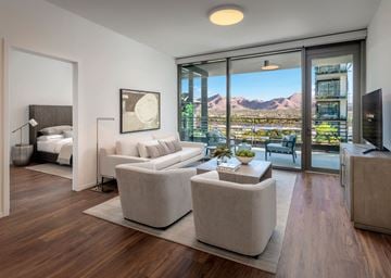 Scottsdale apartment for rent - a living room with a view of the mountains and a couch