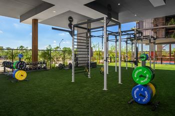 Outdoor fitness area with performance equipment