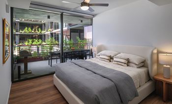 Designer roller shades with blackout shades in bedrooms