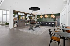 Chicago apartment for rent - A modern dining area with a long table and chairs.