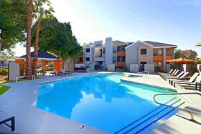 Scottsdale apartment for rent - a swimming pool at the resort with apartments in the background