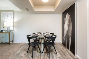 Salt Lake City apartment for rent - a dining room with a table and chairs and a large wall mural of an elephant