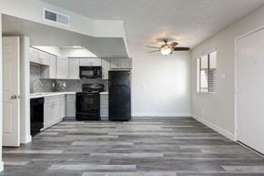 Phoenix apartment for rent - A kitchen with a black oven and microwave.