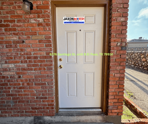 El Paso apartment for rent - A white door with a sign that says "Jaxon's" on it.