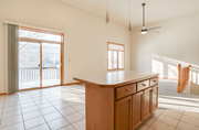 Fargo townhouse for rent - A kitchen with a wooden counter and tile floor.
