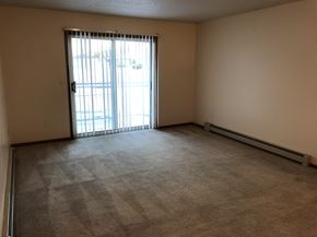 Fargo apartment for rent - Unfurnished Living Room at Royal Oaks Apartments, Fargo