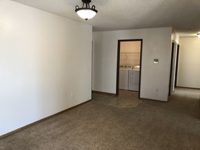 Fargo apartment for rent - Carpeted Living Space at Royal Oaks Apartments, North Dakota, 58103