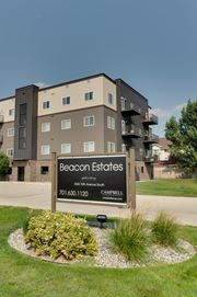 Fargo apartment for rent - a building with a sign that says beacon estates at Beacon Estates Apartments, Fargo, ND, 58103