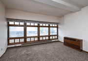 Fargo apartment for rent - A room with a large window and a radiator on the wall at Block 6 Apartments, Fargo, ND, 58103
