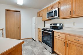 Fargo apartment for rent - Kitchen at Bluemont Village Apartments, Fargo, 58103