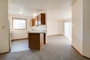 Fargo apartment for rent - Living Room and Kitchen at Dock 9 Apartments, North Dakota