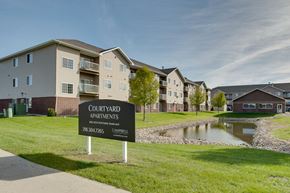 Moorhead townhouse for rent - Exterior View  at Courtyard Apartments on Belsly, Moorhead, Minnesota