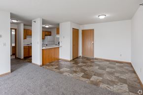St Cloud apartment for rent - Empty living room and kitchen at Hillcrest Apartments, MN, 56301