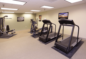 Moorhead apartment for rent - A gym with treadmills, elliptical machines, and other exercise equipment, Kassenborg Apartments, Moorhead, Minnesota