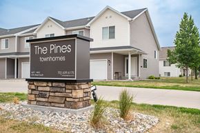 Fargo townhouse for rent - Property Signage at The Pines Townhomes, Fargo