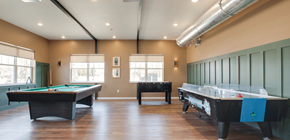Baxter apartment for rent - a game room with two pool tables and two air hockey tables, Pinehurst Apartments, Baxter, 56425