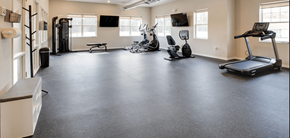 Baxter apartment for rent - an empty gym with exercise equipment on the floor, Pinehurst Apartments, Baxter, 56425