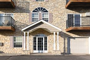 Zimmerman apartment for rent - the front of a brick house with a white garage door Pinewood Estates, Zimmerman, 55398