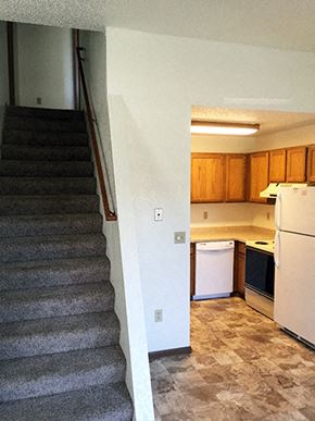 Grand Forks townhouse for rent - Kitchen And Stairs at Wellington Townhomes, Grand Forks, ND, 58201