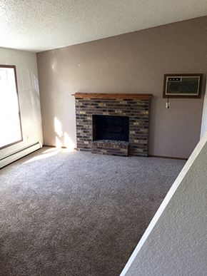 Grand Forks townhouse for rent - Living Area With Fireplace at Wellington Townhomes, Grand Forks, ND
