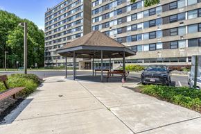 Hamilton apartment for rent - a city park with a gazebo in front of a large building