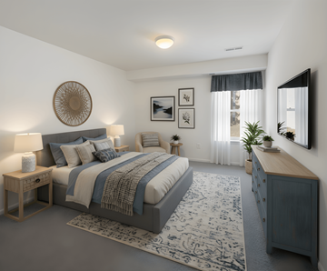 Feasterville apartment for rent - A bedroom with a large bed and a wooden nightstand.