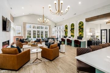 Columbus apartment for rent - a living room with couches and chairs and a table