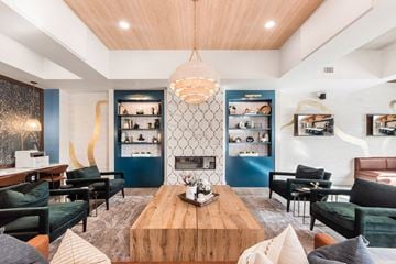 Columbus apartment for rent - a living room with a fireplace and a wooden table