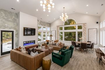 Columbus apartment for rent - a living room with couches and chairs and a fireplace