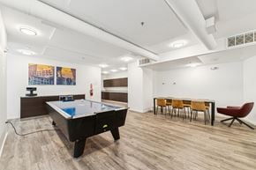 Cleveland apartment for rent - Recreation room with air hockey table and dining area at Lofts at 629 Apartments, Cleveland, OH 44114