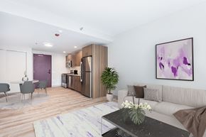 Chicago apartment for rent - a living room with a couch and a table