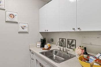 Sink with faucet in kitchen