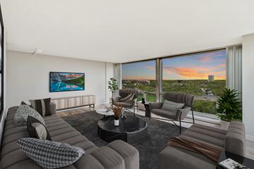 Detroit apartment for rent - a living room with couches and chairs and a large window with a view