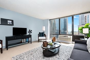 Floor-to-ceiling windows give way to expansive living areas
