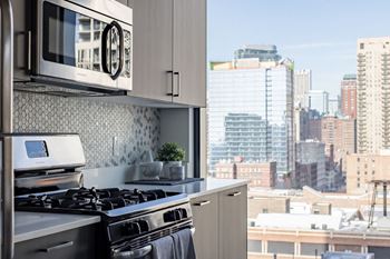 Fully furnished kitchen with stainless steel appliances