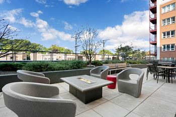 Cozy up to the fire pit at our outdoor lounge