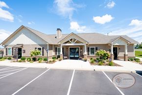 Johnson City townhouse for rent - the exterior of a building with a parking lot and a driveway