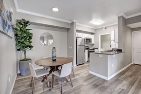 Sacramento apartment for rent - A dining area with a round table and chairs.