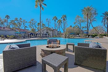 Lagoon-style pool with waterfall and oversized spa