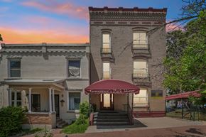 Denver apartment for rent - A building with a sign that says "Governor's Park West" is shown.