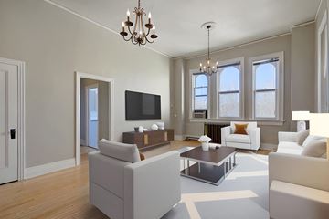 Denver apartment for rent - a rendering of a living room with white furniture and a tv