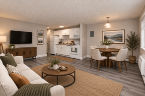 Denver apartment for rent - A living room with a couch, chairs, and a coffee table.